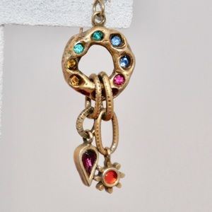 Gold and crystal earrings.  Patricia Locke